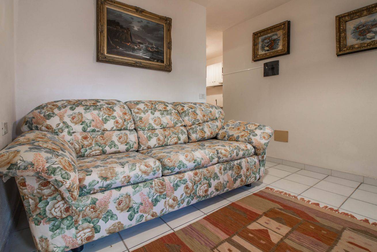 Appartamento intero, Guesthost - Cozy Flat with Garden & Parking in Porto San Paolo, Loiri Porto San Paolo