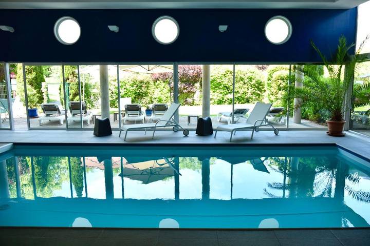 Hôtel pour 2 personnes, avec Terrasse et Jardin ainsi que Piscine et Sauna