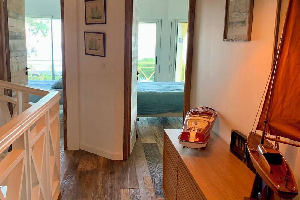 En 1ère ligne Bassin avec vue fascinante - 2 maisons - idéal pour deux familles in Lège-Cap-Ferret, Région d'Arcachon