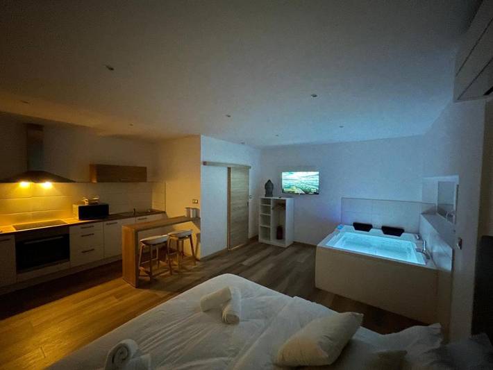 Appartement de vacances pour 2 personnes, avec terrasse ainsi que jardin et jacuzzi