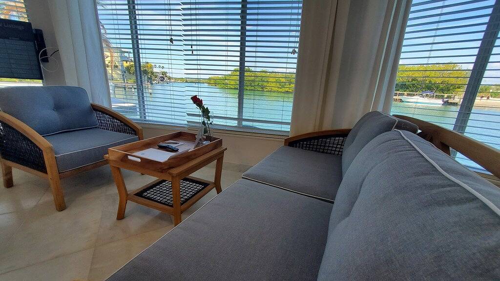 Waterfront Boathouse One Room Bungalow with Private Beach Access in Nokomis Beach, Siesta Key