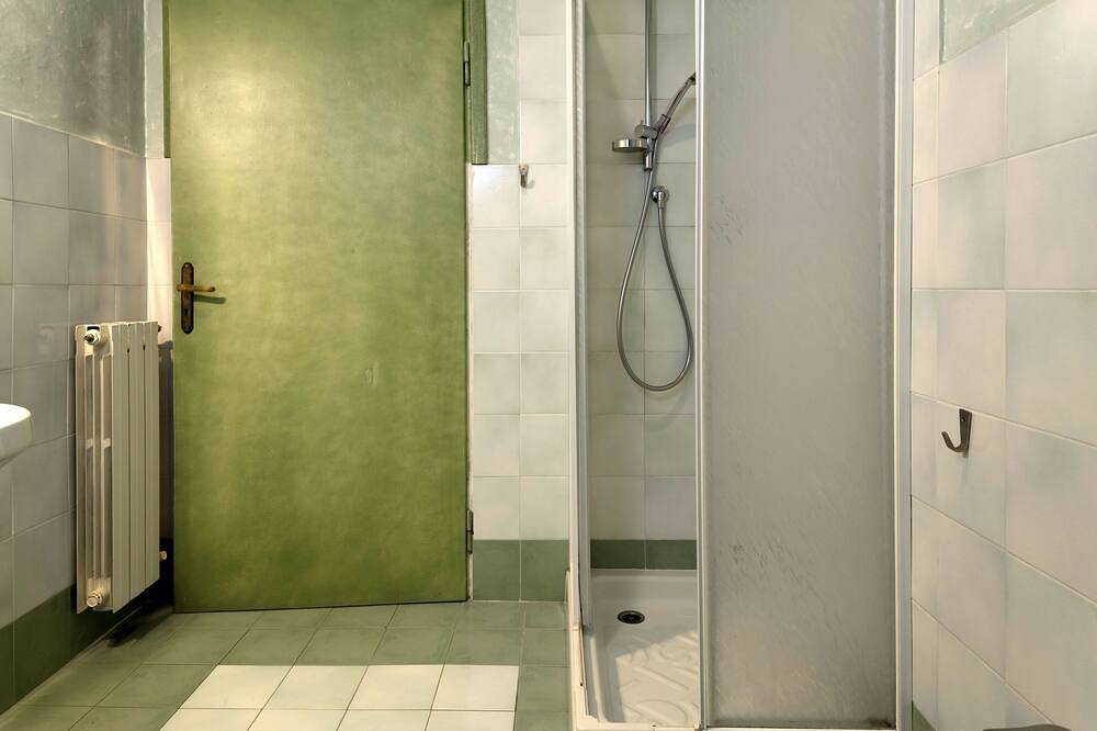 Apartamento entero, Apartamento Ivy con piscina y jardín en común y puntos de vista de San Gimignano in San Gimignano, Provincia de Siena