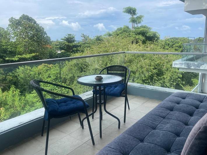 Appartement de vacances pour 2 personnes, avec piscine et vue ainsi que bassin pour enfant et jardin