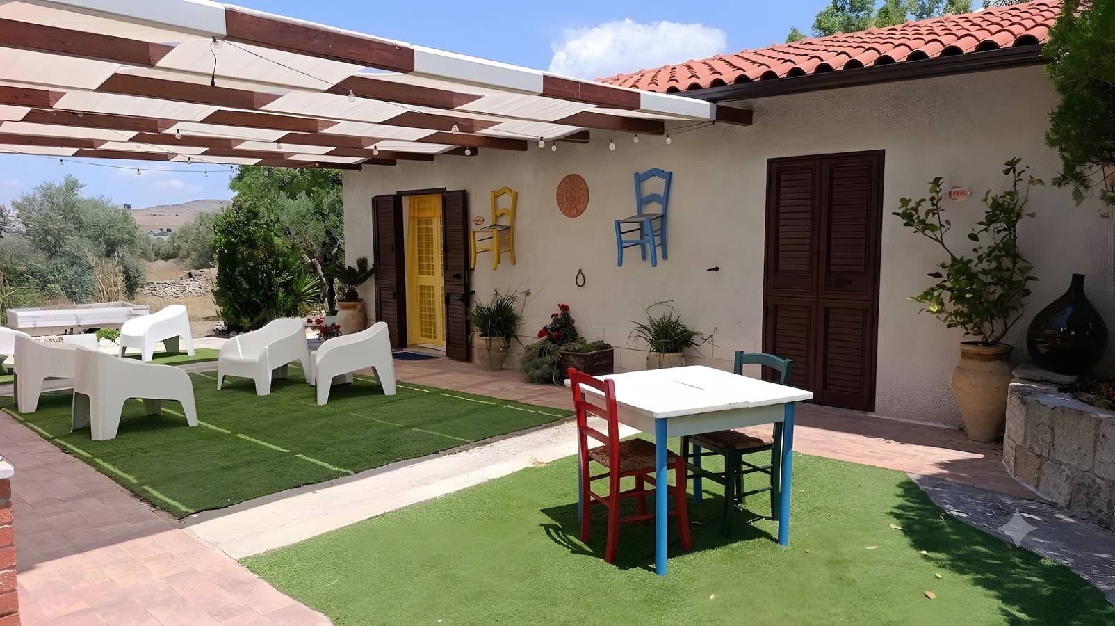 Apartamento entero, New Life Villalba Resort - Apartamento 105 con terraza compartida, Wi-Fi y aire acondicionado in Villalba, Provincia de Caltanissetta