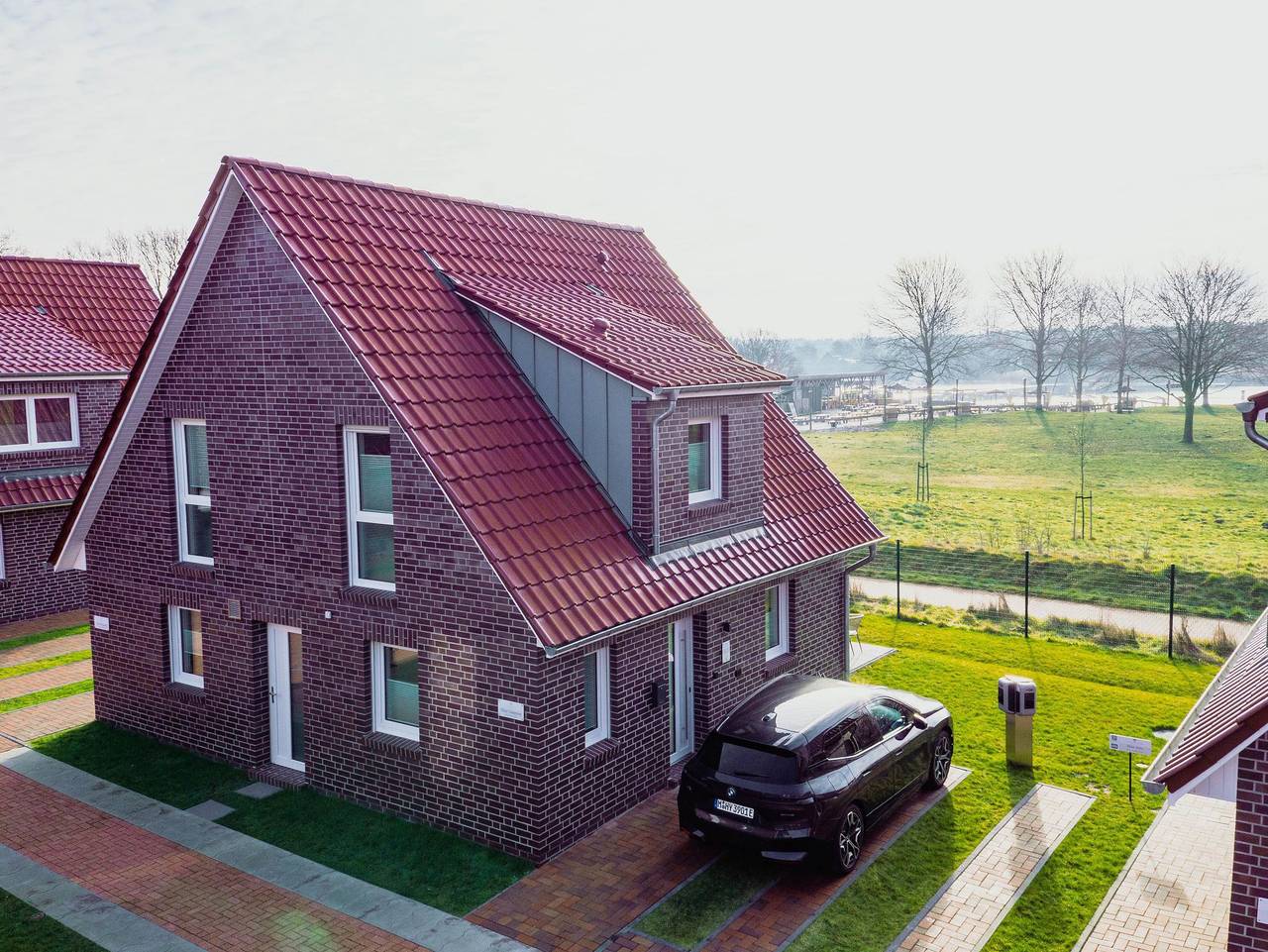Ganze Ferienwohnung, Küsten Apartments Tannenhausen - Ferienhaushälfte Straßenseite in Aurich, Landkreis Aurich