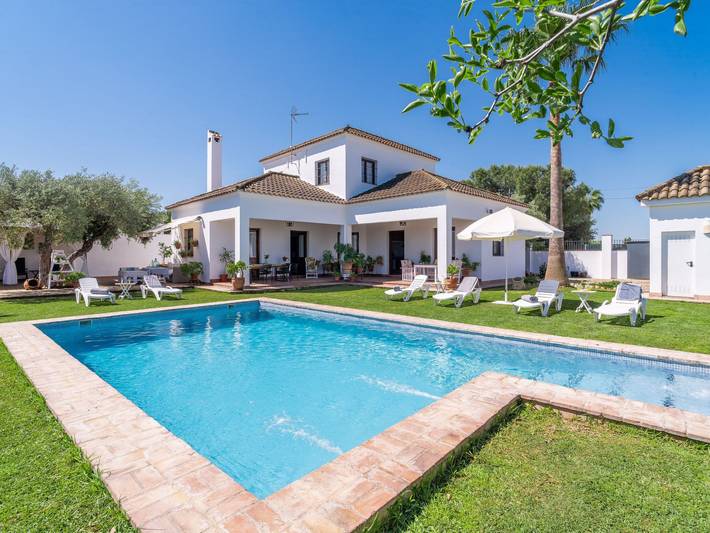 Casa de vacaciones para 8 personas, con Terraza además de Jardín y Piscina en Marchena