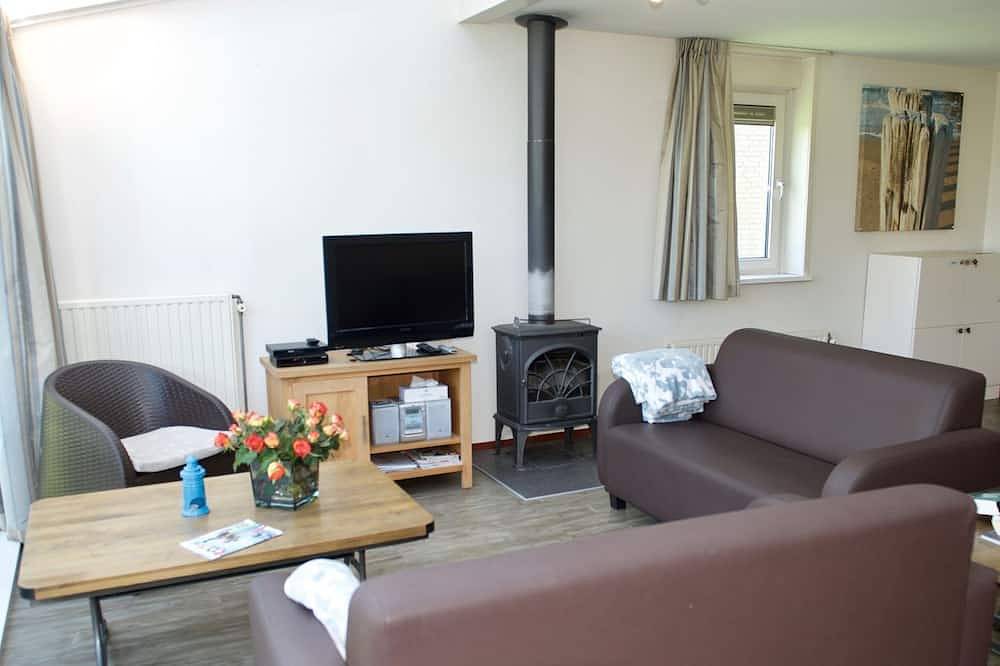 Antibes 252 - Freistehendes Ferienhaus direkt am See mit großem Garten in Hoofdplaat, Zeeuwse Kust