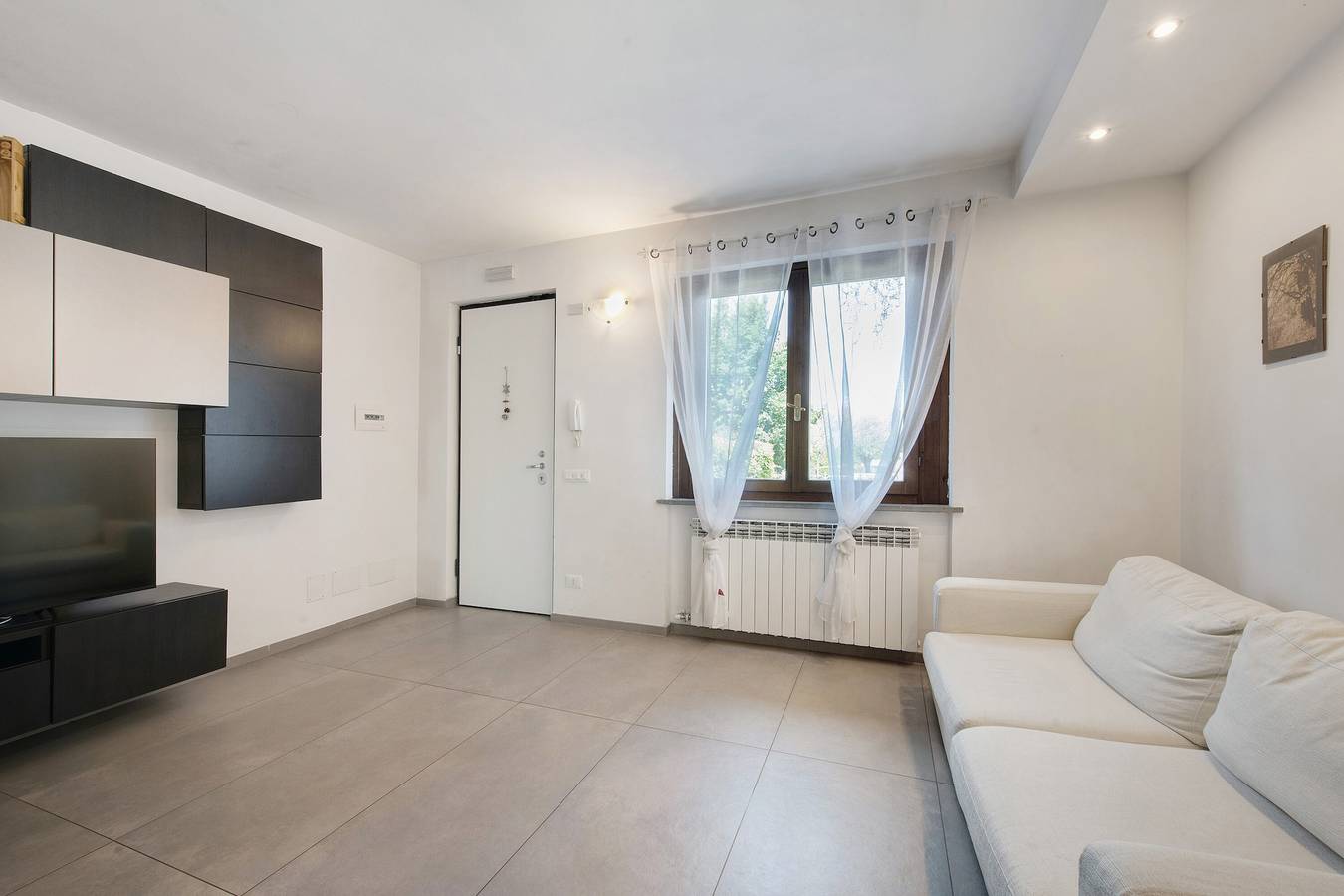 Appartamento intero, Appartamento 'Caky's House' con terrazza condivisa, Wi-Fi e aria condizionata in Rivoltella del Garda, Desenzano del Garda
