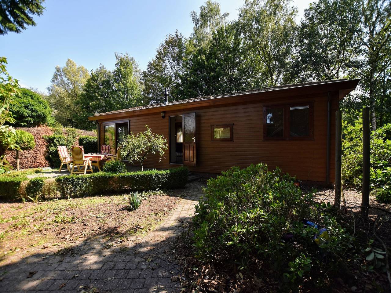 Spacious Chalet in Garderen with Fenced Garden in Veluwe