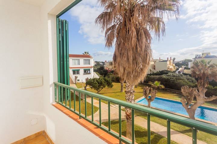Entire apartment, Apartment Cala en Forcat 36 with Balcony & Shared Pool in Cala Blanes, Ciutadella