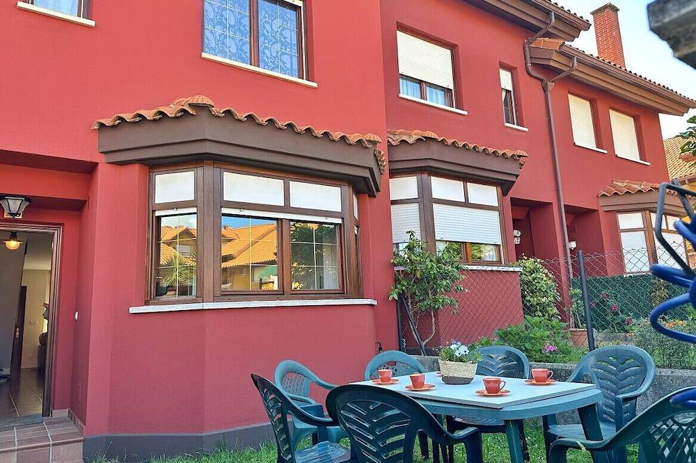 Semi-detached house with private garden and communal pool in Ajo, Bareyo