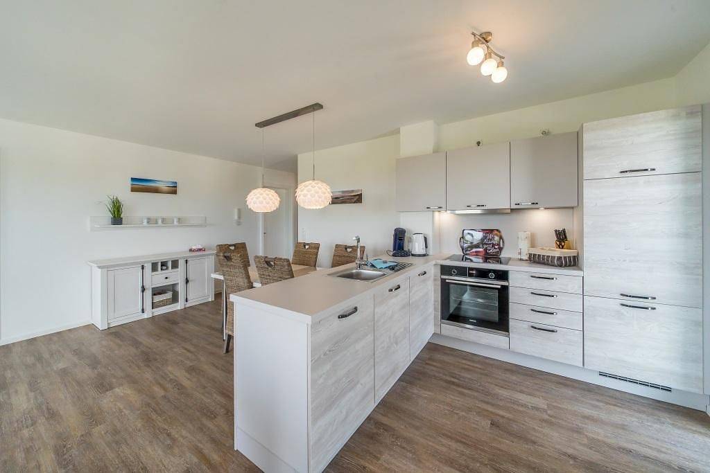 Ganze Wohnung, Premiumapartment in toller Lage am Deich mit Sauna, großem Balkon und Meerblick in Schillig Strand, Wangerland