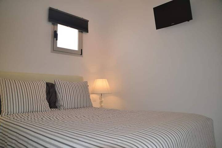 Apartamento entero, Hogar desde casa Apartamento de lujo de 2 dormitorios con piscina climatizada. in Puerto del Carmen, Tías
