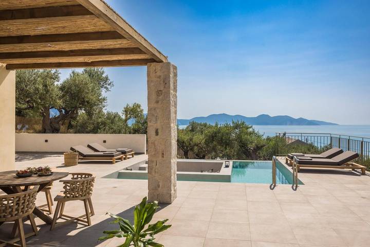 Location de vacances pour 4 personnes, avec piscine ainsi que jardin et vue dans Άσος
