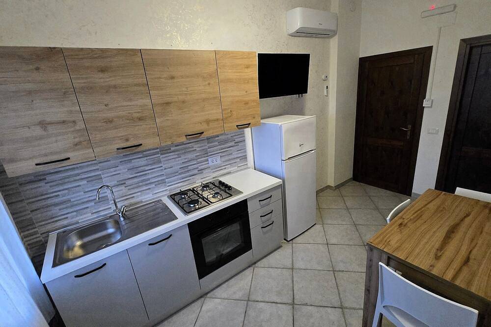 Apartamento entero, Attic family apartment surrounded by nature, 2 minutes from the sea. in Biancareddu, Sassari