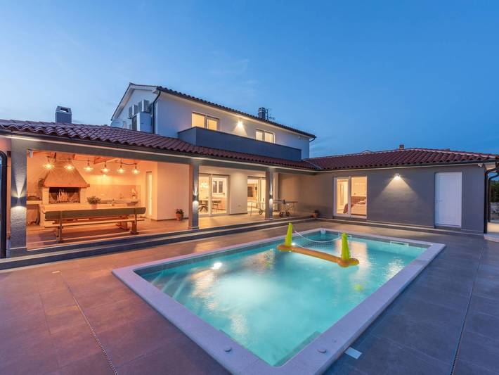 Ferienhaus für 7 Personen, mit Terrasse und Garten