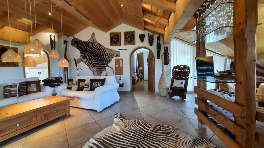 Appartement entier, Appartement "Fewo Eitermoser Afrikanischer Traum" avec terrasse privée, jardin privé et Wi-Fi in Pfaffing, Arrondissement de Rosenheim