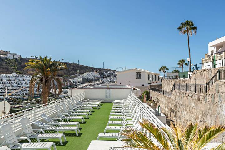 Apartamento entero, "Apartamento Cumana 2 - pool view" con vistas a la montaña, terraza, piscina compartida y Wi-Fi in Puerto Rico (Gran Canaria), Mogán