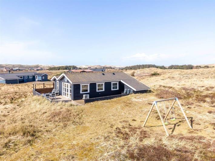 Ferieudlejning for 4 personer, med jacuzzi og sauna samt terrasse, husdyr tilladt i Årgab