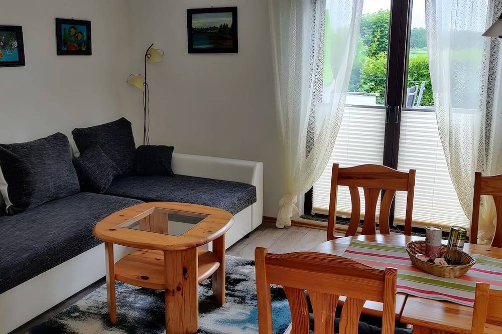 Ferienbungalow für 4 Personen, 32 m², mit Gemeinschaftsgarten, Terrasse und Wlan in Kölpinsee, Loddin