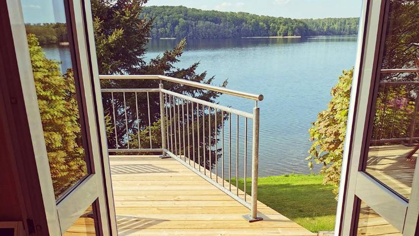 Ferienhaus für 3 Personen, mit Terrasse und Garten sowie Seeblick und Ausblick in Pinnow