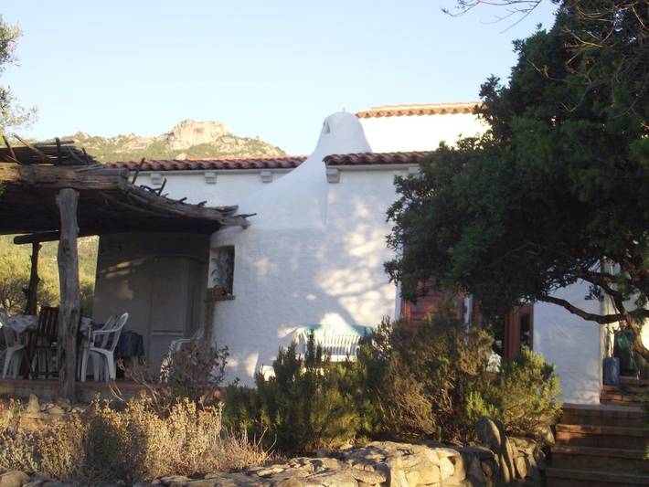 Maison d’hôte pour 2 personnes, avec jardin ainsi que vue et terrasse à Cugnana