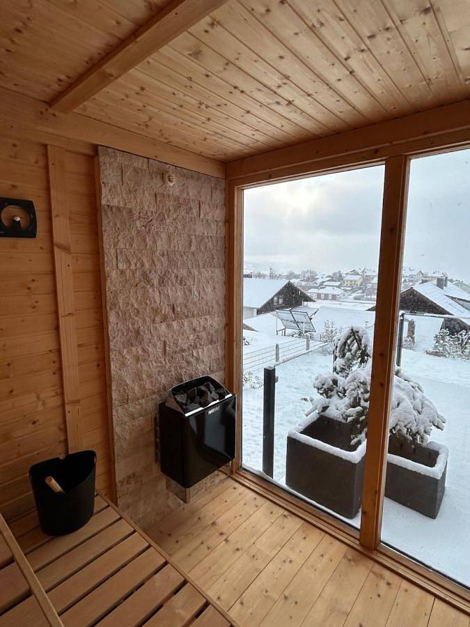 Ferienwohnung für 2 Personen, mit Terrasse und Garten sowie Sauna und Ausblick