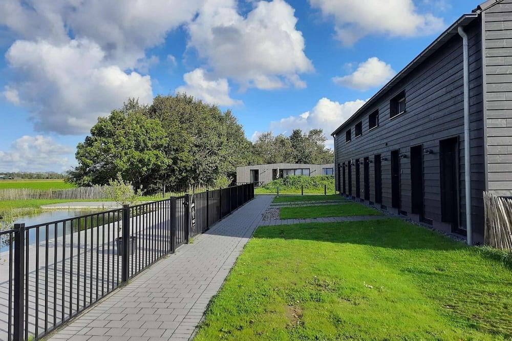 Groot vakantiehuis met zwembad, 5 minuten van het strand in Groede, Zeeuwse Kust