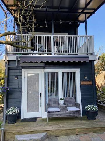 Ferienwohnung für 2 Personen, mit Terrasse und Garten sowie Ausblick in Zaandam