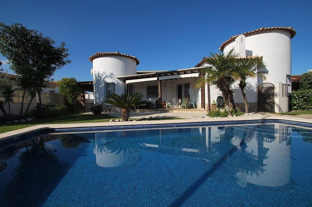 Chalet con piscina privada, aire acondicionado, internet in Oliva, Costa Blanca