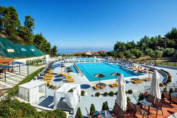 Hôtel pour 2 personnes, avec bassin pour enfant et piscine ainsi que vue et jardin dans Pefkochori