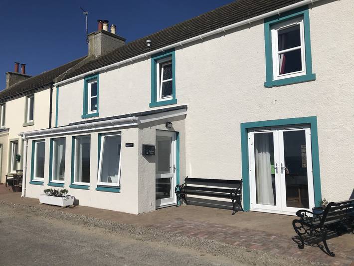 Vakantiehuis voor 6 personen, with Uitzicht op zee and Terras as well as Tuin in de Highlands