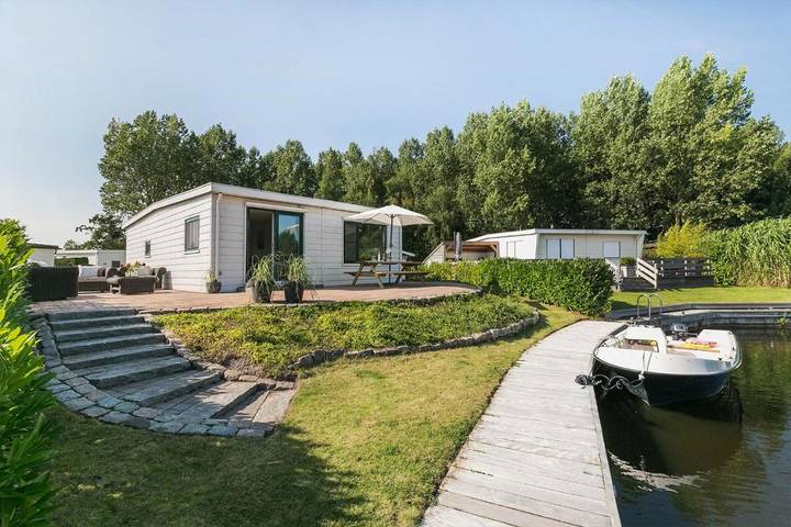 Ferienhaus für 5 Personen, mit Terrasse und Garten sowie Seeblick und Ausblick