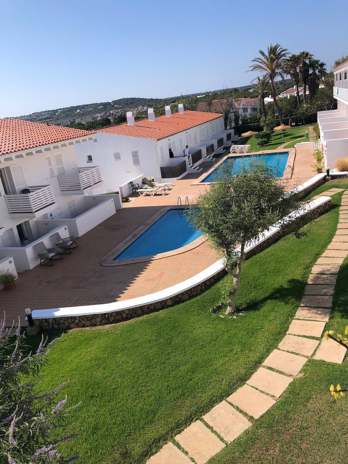 Apartamento entero, Apartamento con terrazas , patio, parking ,parque, jardín y piscinas. in Son Parc, Es Mercadal
