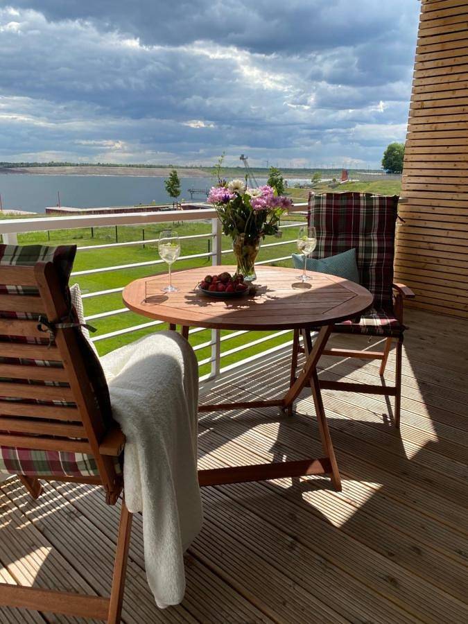 Ferienwohnung für 4 Personen, mit Balkon und Seeblick sowie Ausblick in Großräschen