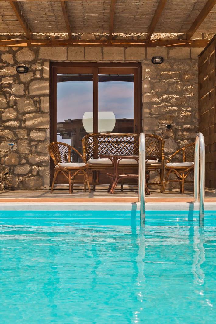 Casa vacanza per 2 persone, con piscina e terrazza nonché vista oceano a Scarpanto