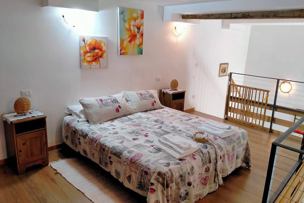 Ganze Wohnung, Fewo Luino Loft: Historisches Design, 100m zum See & Ruheoase. in Luino, Comune di Luino