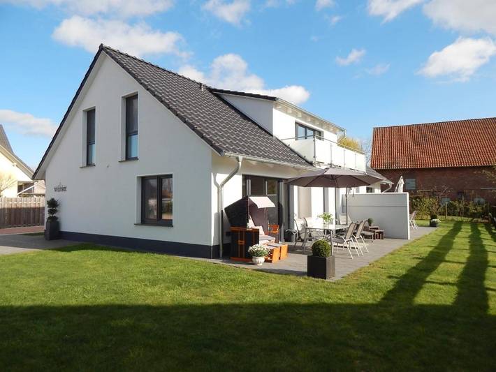 Ferienwohnung für 4 Personen, mit Terrasse und Garten sowie Sauna und Ausblick