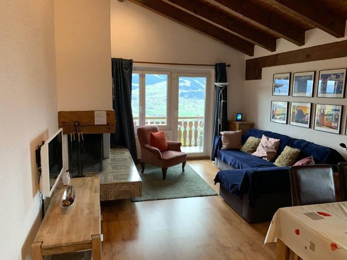 Ferienwohnung für 3 Personen, mit Balkon und Pool sowie Ausblick in Mundaun