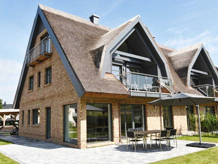 Strandhaus für 8 Personen, mit Garten und Balkon sowie Sauna, kinderfreundlich in Lobbe