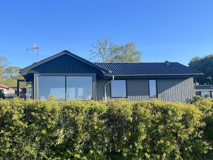 Ferienhaus für 4 Personen, mit Terrasse und Seeblick sowie Ausblick und Garten