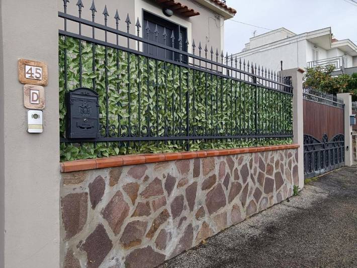 Camera Quadrupla Dell'Arco Romano con Terrazza Privata, Wi-Fi e Aria Condizionata