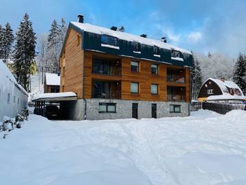 Ferienwohnung für 5 Personen, mit Garten und Ausblick in Spindlermühle