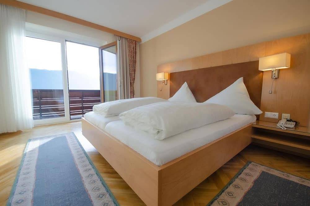 Doppelzimmer, Dusche/Wc z. T. getrennt im Zimmer - Hotel Ossiacher See**** in Steindorf am Ossiacher See, Oberkärnten