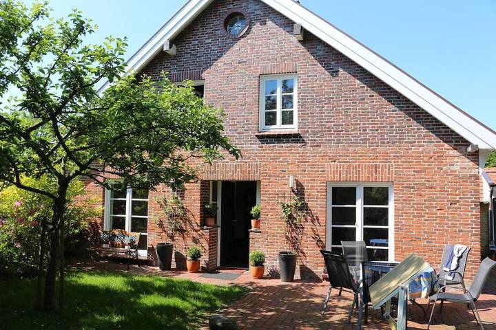Ferienhaus für 4 Personen, mit Garten und Ausblick sowie Sauna in Dornumersiel
