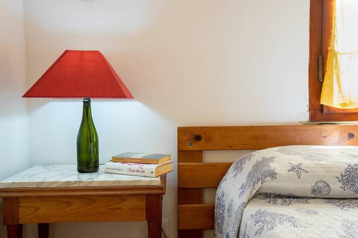 Apartamento entero, Apartamento "Lila" con vistas al mar, terraza privada y Wi-Fi in Pivarada, Alguer