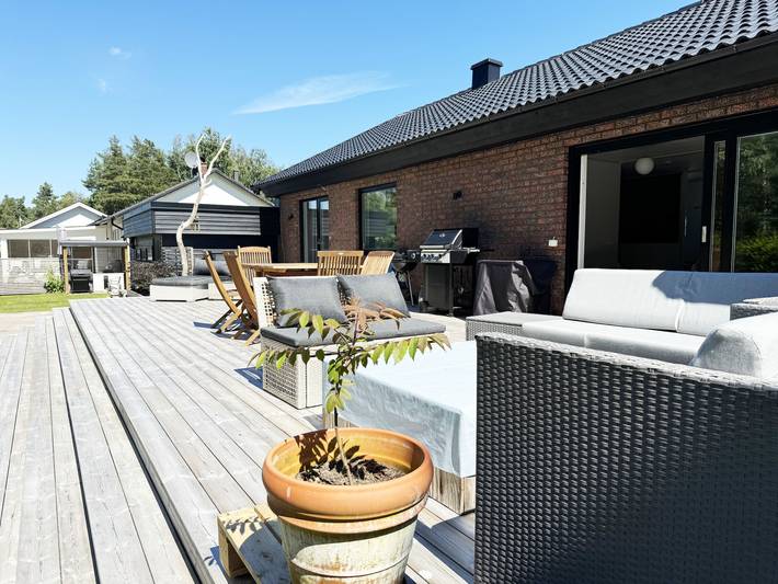Ferienhaus für 7 Personen, mit Terrasse und Garten sowie Sauna in Karlsborg