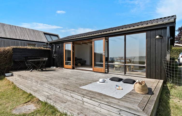 Ferienhaus für 4 Personen mit Garten in Følle Strand, Süddjursland
