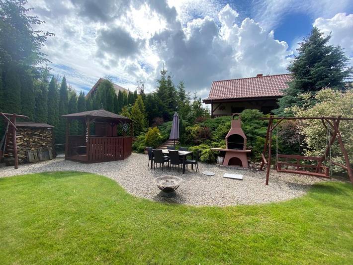 Ferienhaus für 8 Personen, mit Terrasse und Garten sowie Sauna und Seeblick in Orzysz