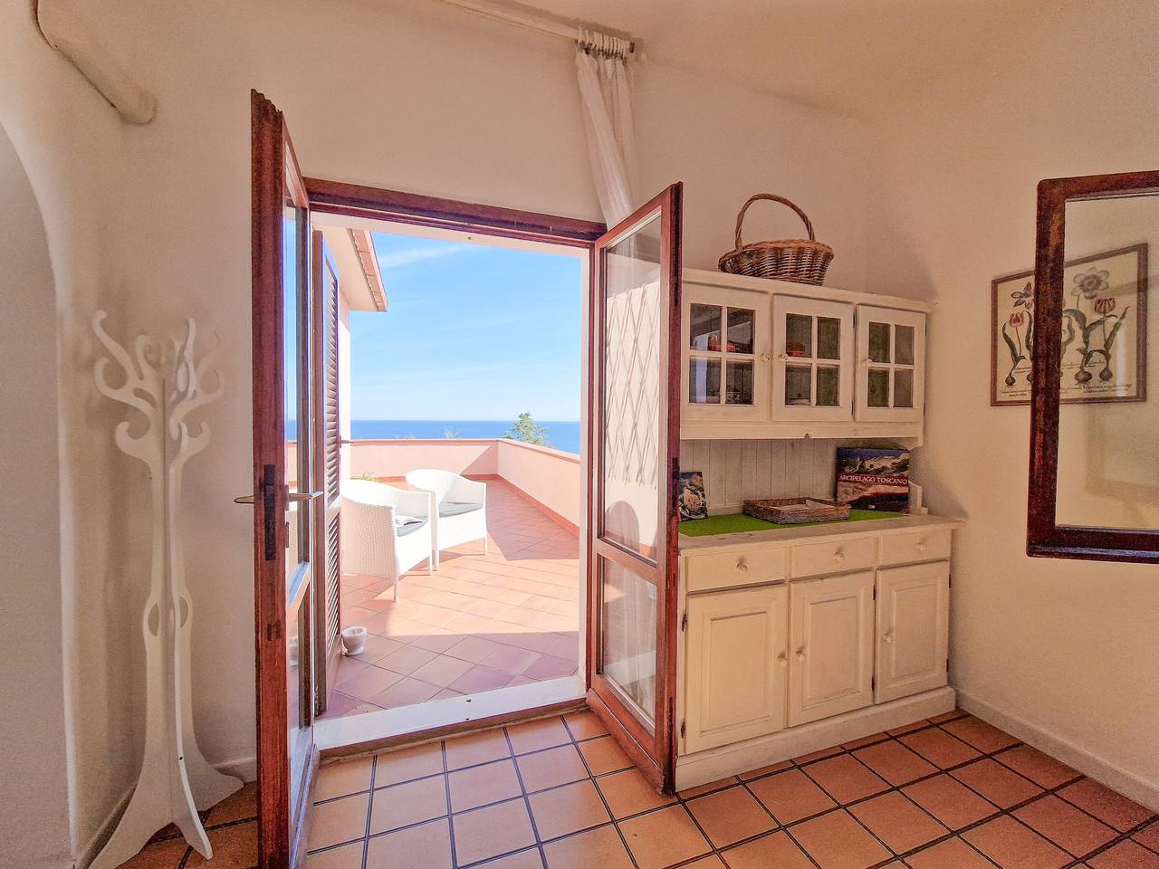 Casa de vacaciones 'Trilocale Maestrale Beach' con vistas al mar, terraza y aire acondicionado in Portoferraio, Parque Nacional del Archipiélago Toscano